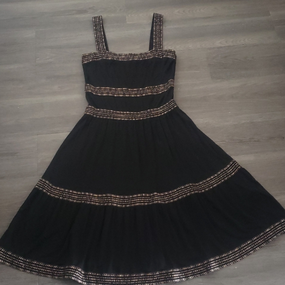 Black dress with tan and black band details